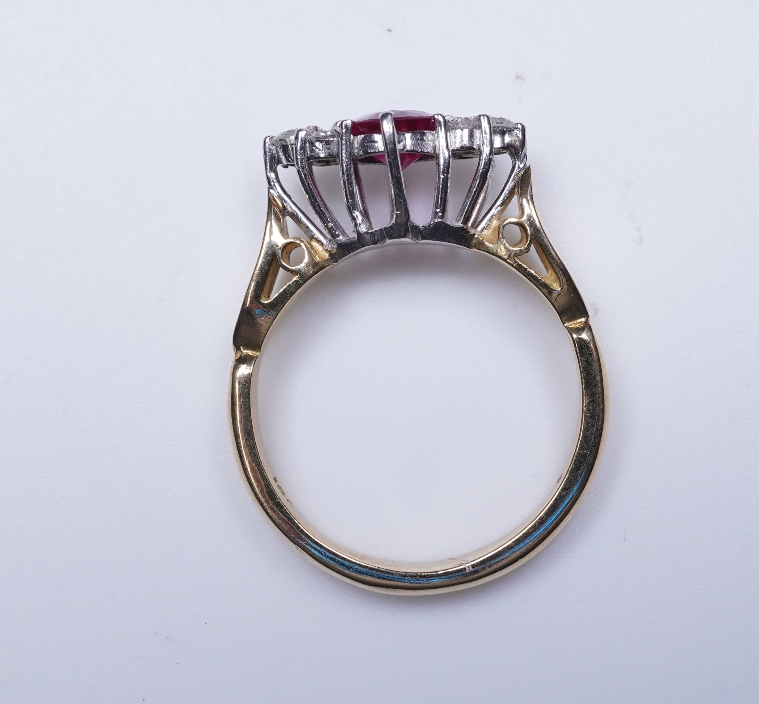 A synthetic ruby and diamond ring